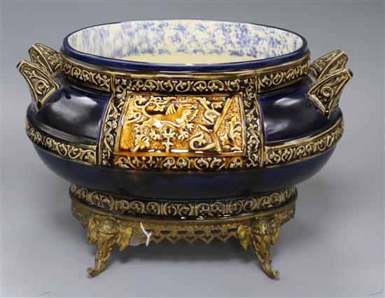 A late 19th century French Majolica style gilt mounted based jardiniere length 34cm